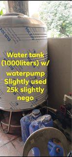 Water tank with pump