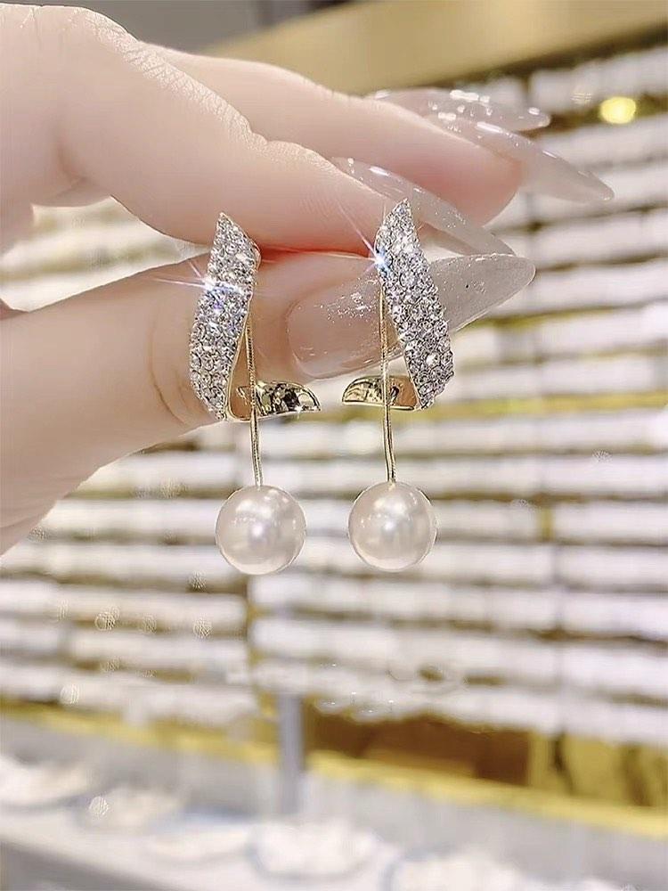Gold diamond sales pearl earrings