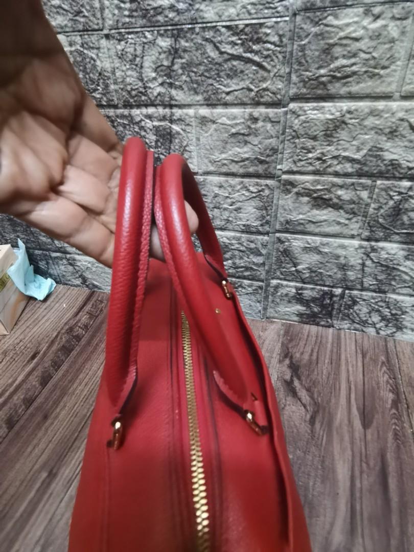 Louis Vuitton Speedy 25 cm Handbag in Red Empreinte Monogram Leather