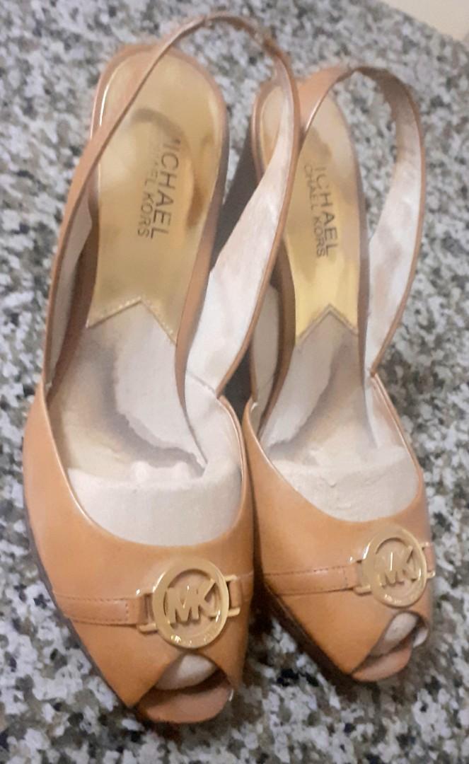Michael kora wedge (Category: Wedges) located in Zamboanga. Submitted by goodforless (Listing ID 1190548894, Image 2). Description: selling michael kors wedge very nice n light lng po have water stain.