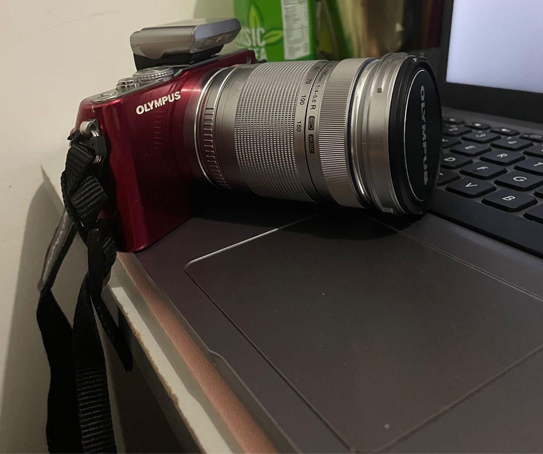 Olympus PEN E-PL3 Lite (Red) (Category: Cameras) located in Cavite. Submitted by danielleflv (Listing ID 1172974516, Image 3). Description: Olympus PEN E-PL3 14-42mm 12.3 MP Mirrorless Digital Camera with CMOS Sensor and 3x Optical Zoom (Red) + COMPLETE ACCESSORIES - No issues. Works well.Minor paint scratches on side - Rfs: Not in use - Comes with Battery, Charger, Lens (See photo), Camera strap, Camera Bag, and other accessories in the photo. -