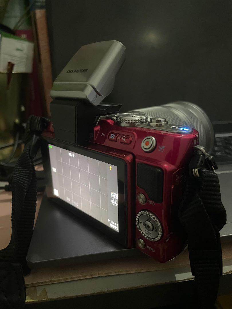 Olympus PEN E-PL3 Lite (Red) (Category: Cameras) located in Cavite. Submitted by danielleflv (Listing ID 1172974516, Image 2). Description: Olympus PEN E-PL3 14-42mm 12.3 MP Mirrorless Digital Camera with CMOS Sensor and 3x Optical Zoom (Red) + COMPLETE ACCESSORIES - No issues. Works well.Minor paint scratches on side - Rfs: Not in use - Comes with Battery, Charger, Lens (See photo), Camera strap, Camera Bag, and other accessories in the photo. -