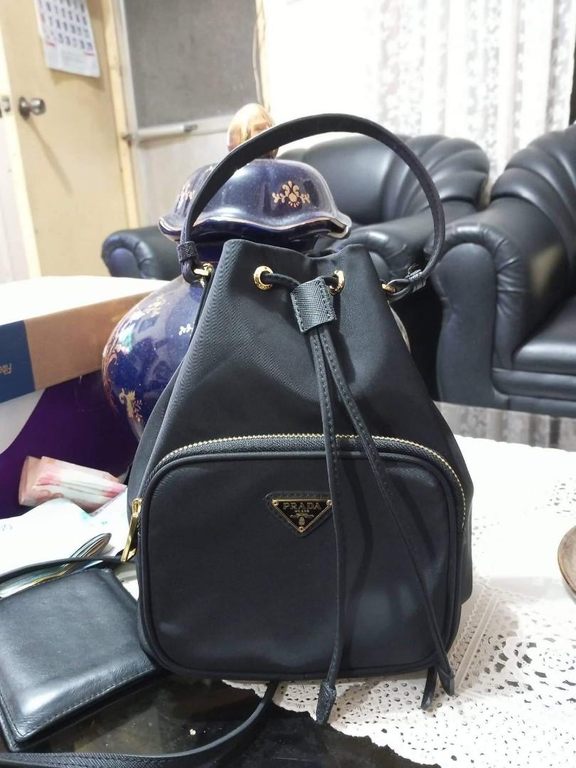 Prada bucket sling bag, Luxury, Bags & Wallets on Carousell