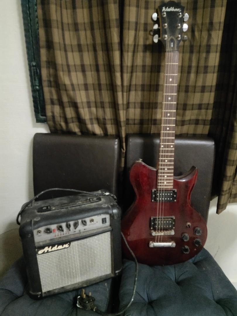 Used electric guitar. Come with amp and distortion Hobbies Toys