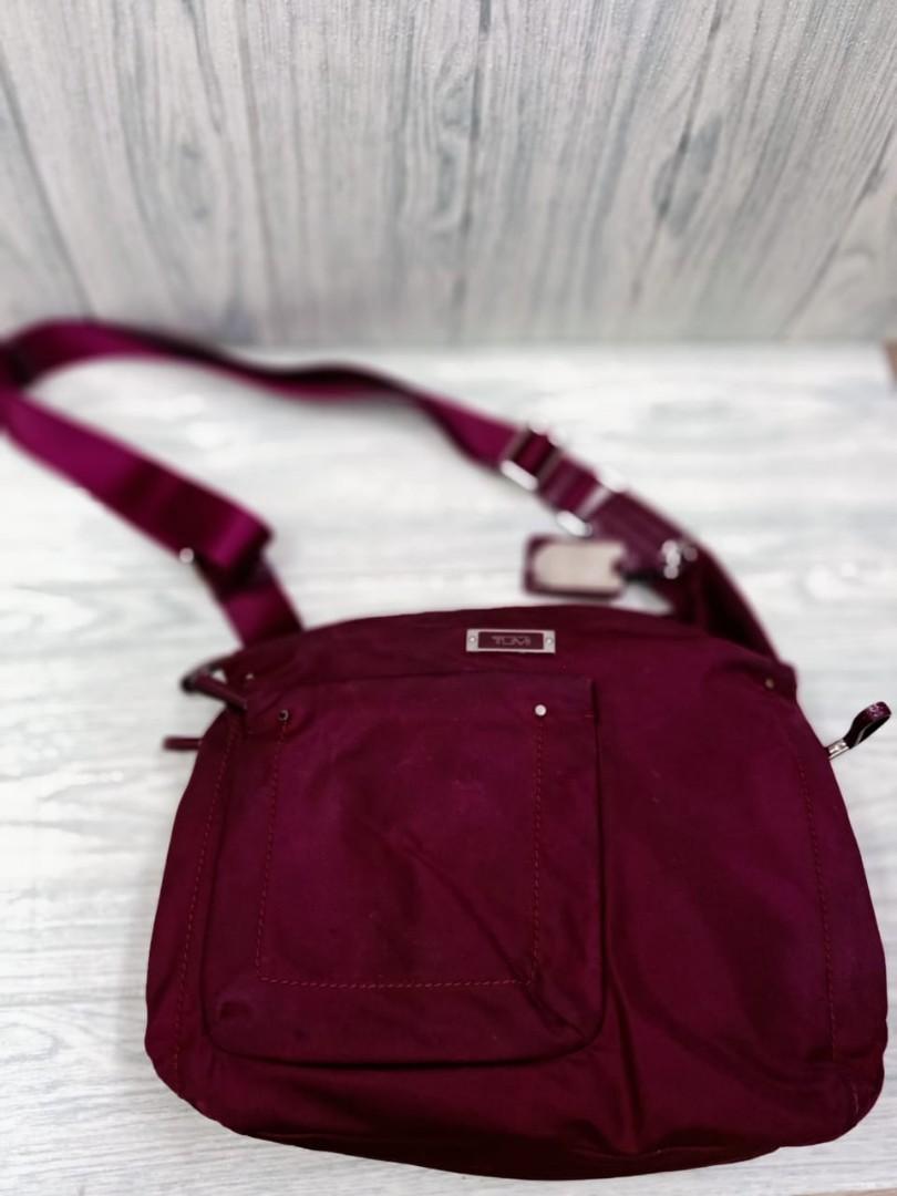 Used Tumi Voyageur Sumatra Crossbody bag in Burgundy color Luxury