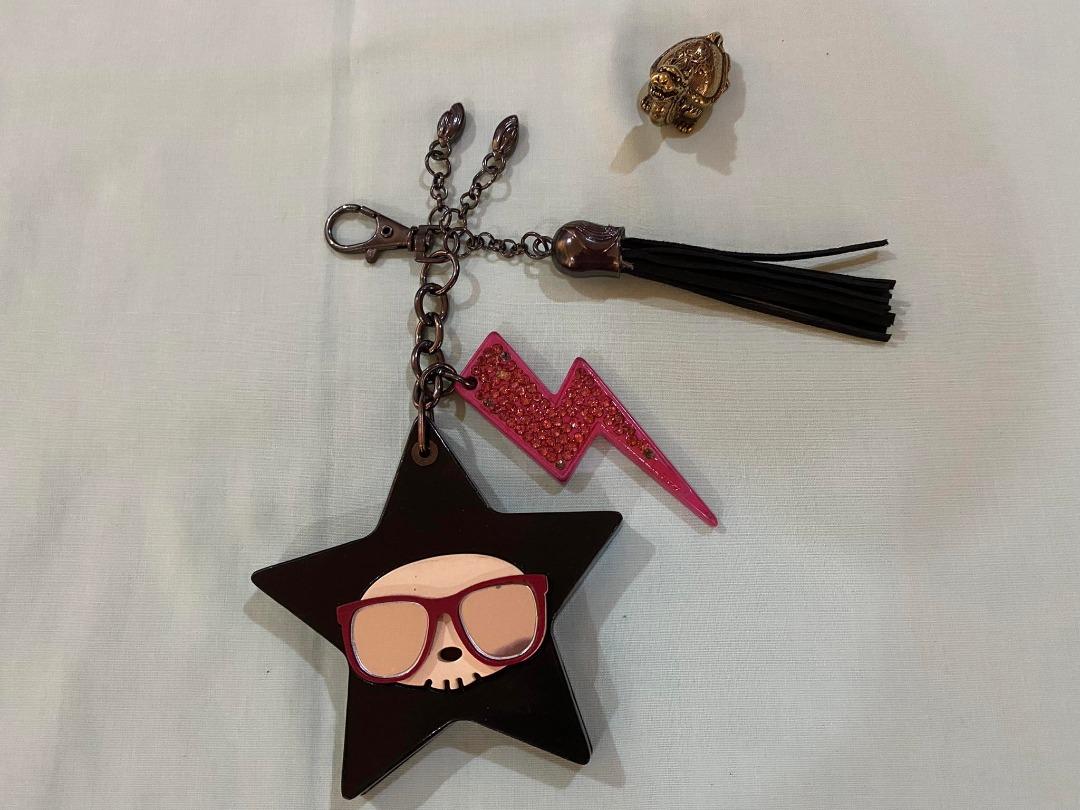 Authentic Tokidoki Bag Charm With Mirror (Category: Charms) located in Manila. Submitted by etcetera.mnl (Listing ID 1190843581, Image 1). Description: Material: Acrylic (thick) Flaw: missing rhinestones Front - 3.5 inches Height - 3 inches Selling low 600.