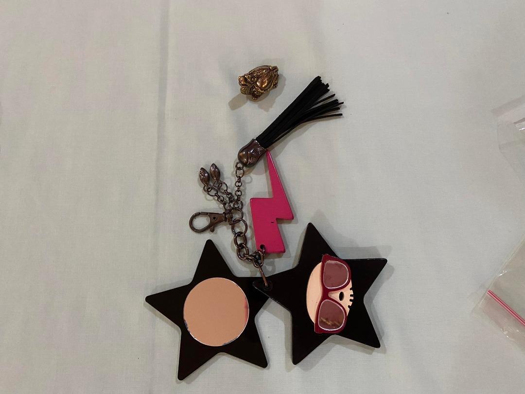 Authentic Tokidoki Bag Charm With Mirror (Category: Charms) located in Manila. Submitted by etcetera.mnl (Listing ID 1190843581, Image 3). Description: Material: Acrylic (thick) Flaw: missing rhinestones Front - 3.5 inches Height - 3 inches Selling low 600.