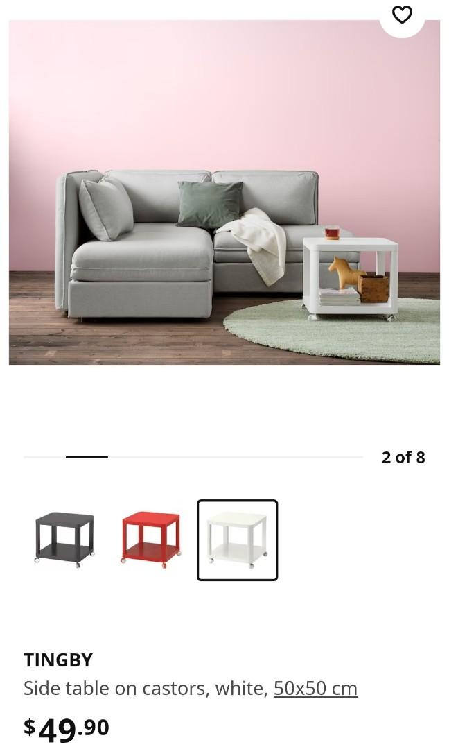 Tingby side outlet table on castors