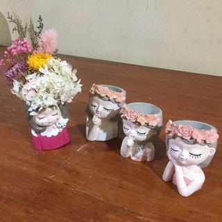 Mini concrete pot with dried flowers