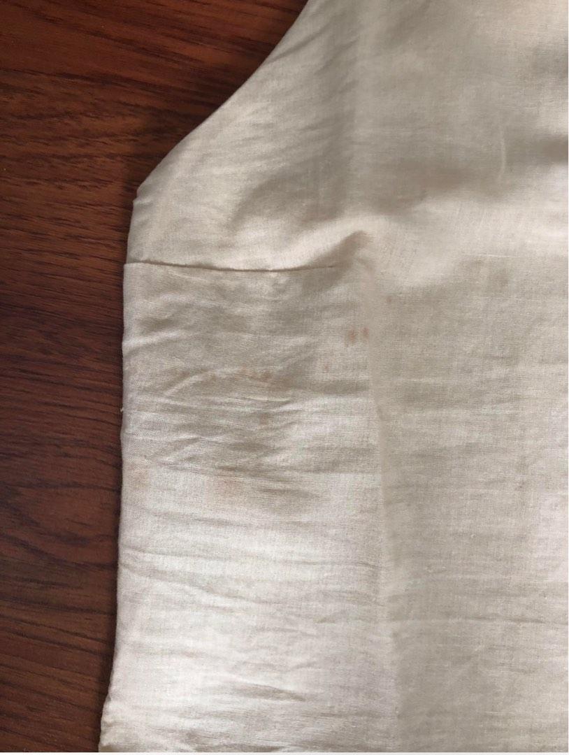 Oat/Beige Linen Top (Category: Sleeveless) located in Quezon. Submitted by indmlnt (Listing ID 1184980246, Image 3). Description: Washed but never worn Bought it with slight stain (see photos) Retail price is 1,200 Brand: Isla Ethis Super cute but too small for me.