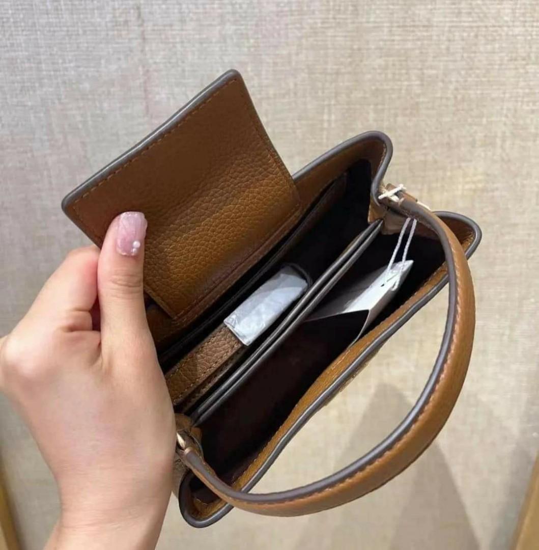 🇺🇲 New Authentic Tory Burch Britten Top handle Small Bag (Category: Luxury Bags & Wallets) located in Santa Cruz. Submitted by janelovebagswatchesshoesph (Listing ID 1190922068, Image 3). Description: with tag, dust bag and paper bag.