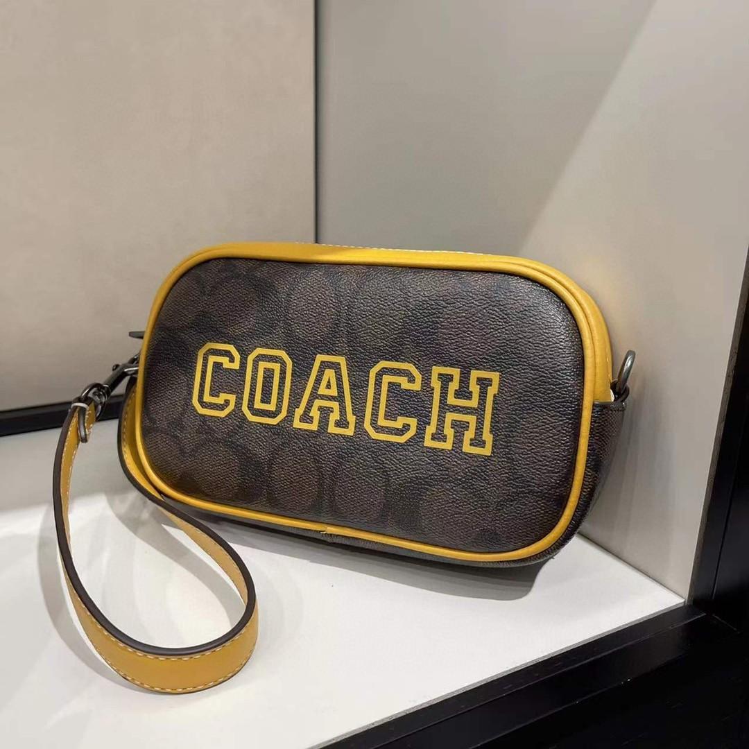 Coach wrist bags best sale