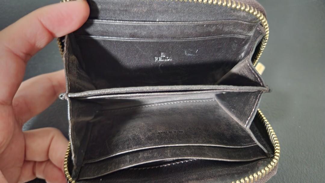 Authentic Fendi zippy card case (Category: Luxury Bags & Wallets) located in Quezon City. Submitted by myprelovedfindsph (Listing ID 1191056010, Image 3). Description: Fendi zippy card case, can be a short wallet, minor scuffs on the pipings.