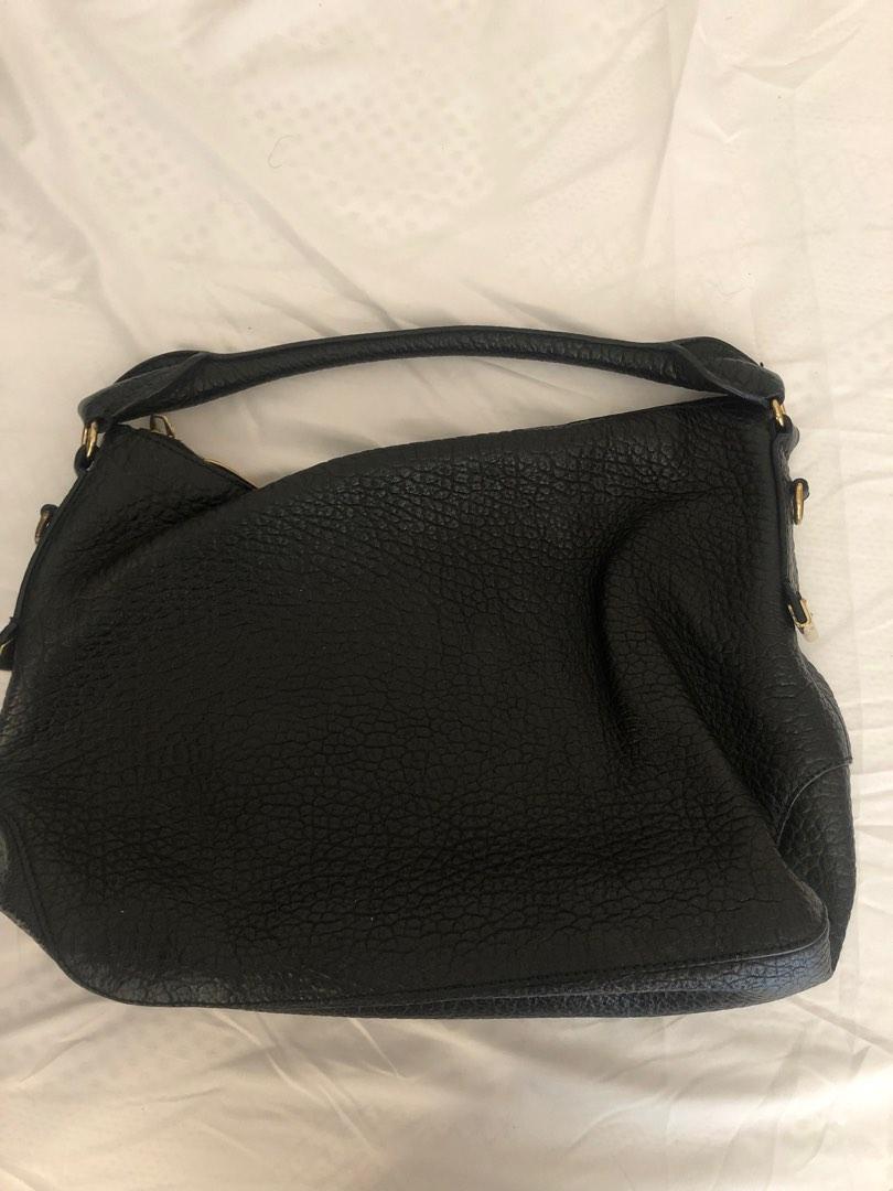 Burberry 2-way Bag (Category: Luxury Bags & Wallets) located in Manila. Submitted by decluttering.princess (Listing ID 1191041168, Image 2). Description: Original No inclusions Detachable sling strap Repriced Evel lower to 4,500 Negotiable Loc: Valero Makati.