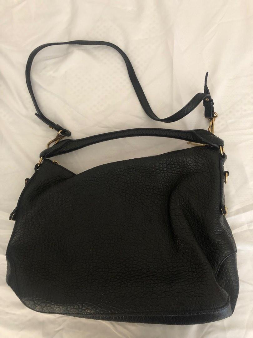 Burberry 2-way Bag (Category: Luxury Bags & Wallets) located in Manila. Submitted by decluttering.princess (Listing ID 1191041168, Image 1). Description: Original No inclusions Detachable sling strap Repriced Evel lower to 4,500 Negotiable Loc: Valero Makati.