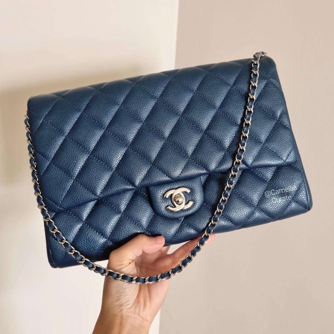 Chanel Classic Clutch with Chain Dark Blue Caviar Silver HW, Luxury, Bags &  Wallets on Carousell