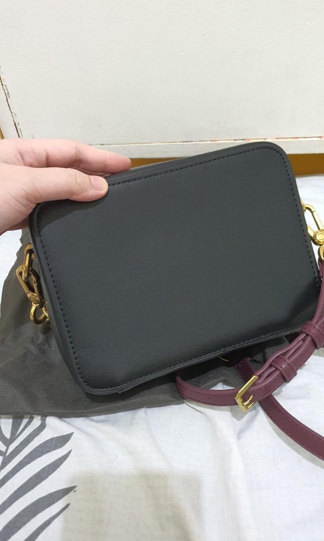 Charles and Keith (Category: Cross-body Bags) located in Bulacan. Submitted by krixa (Listing ID 1190979517, Image 3). Description: Like new, used once Camera Bag Charles & Keith Black- Maroon cross body bag Note: this is not an authentic c&k bag, class A only we can do lalamove, grab (sf c/o buyer) Thank you!.