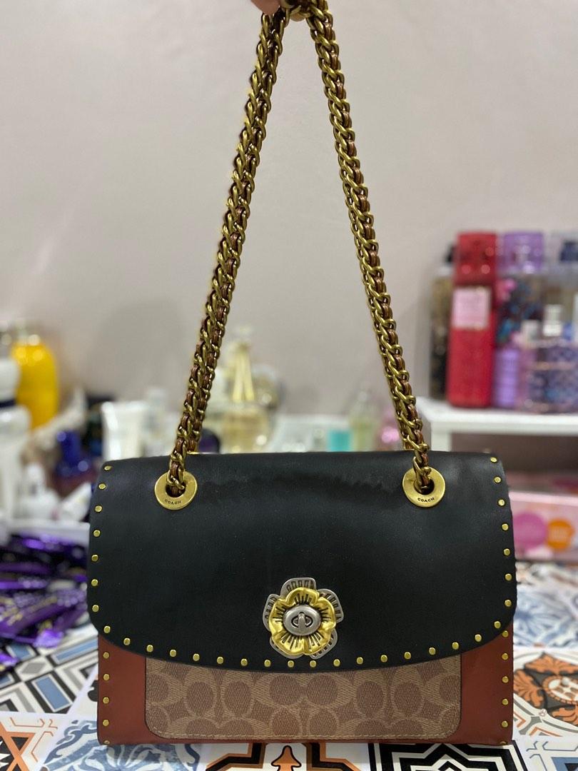 Coach parker with border rivets and snakeskin detail new arrivals