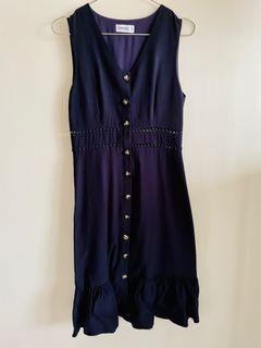 Playdress navy sleeveless dress with ruffled bottom and peekaboo embroidery