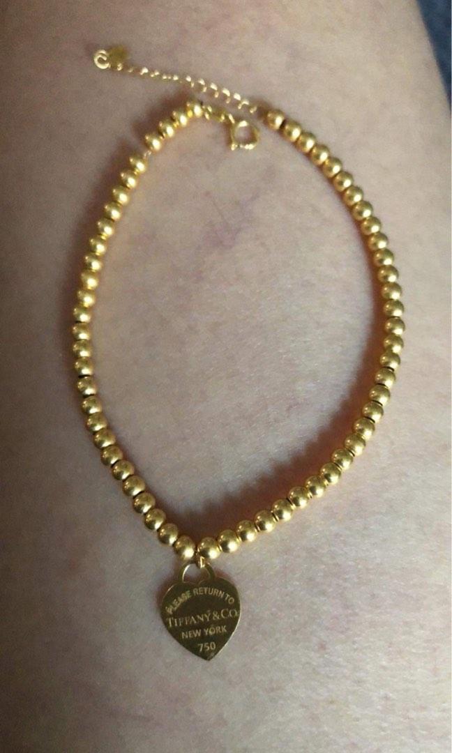 Gold tiffany top bead bracelet