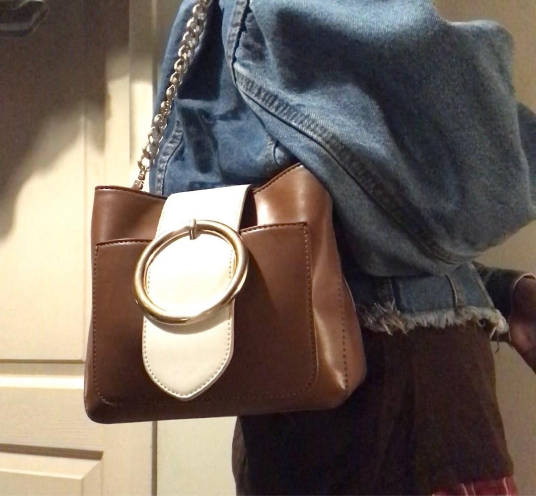 Shoulder bag (Category: Shoulder Bags) located in Pasig City. Submitted by hanjeongsik (Listing ID 1191086731, Image 1). Description: **PLEASE READ** > Color: White, Brown, Gold > Hardware: sobrang shiny pa rin > Inner: divider, 1 open pocket, 1 zipped pocket, no flaws > Zipper: working just fine > Closure: Magnetic clasp > Short strap: New, perfect condition > Long strap: Flawed see photo Kindly check each photo for minor flaws and please manage