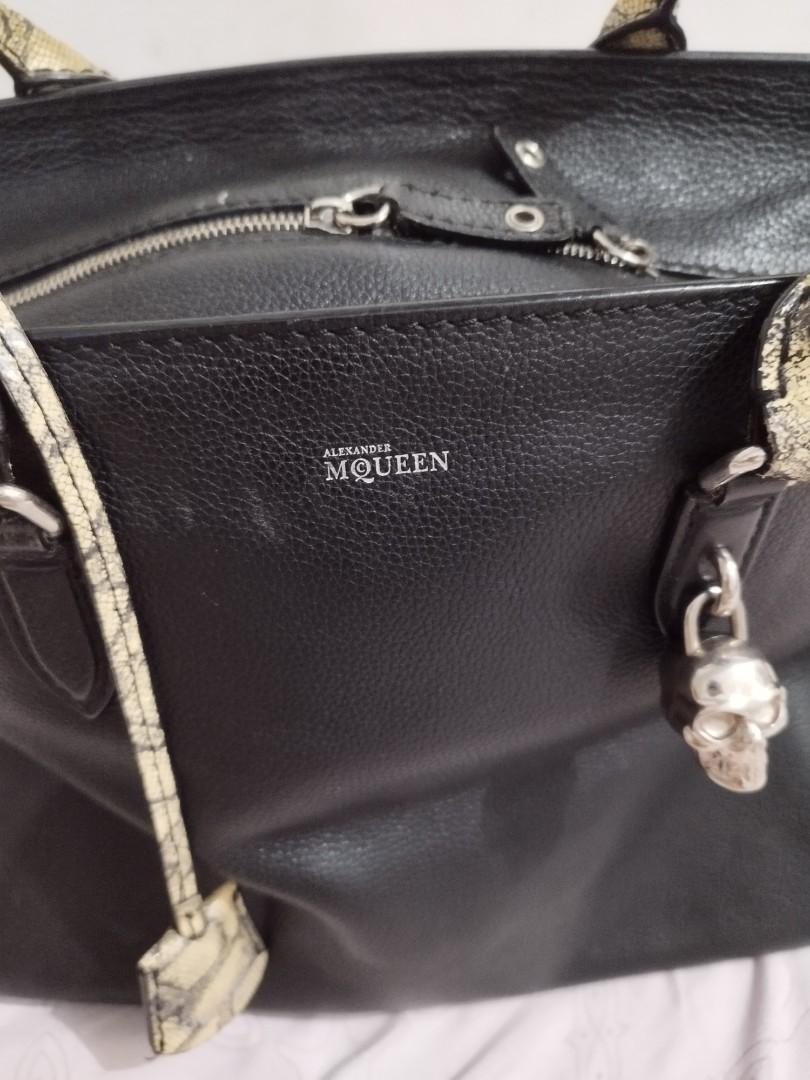 Alexander McQueen Padlock Zip Around Tote Leather (Category: Luxury Bags & Wallets) located in Taytay. Submitted by nenengbib (Listing ID 1191281215, Image 3). Description: Selling low: limited edition python skin Alexander McQueen Zip Around Tote Leather bag. Honest issue, discoloration on handle due to use. Very rare find. RFS: Decluttering.