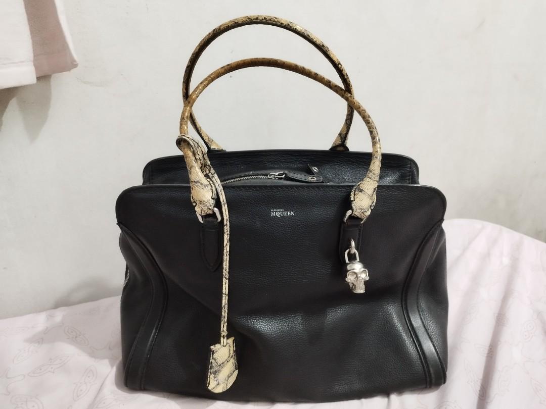Alexander McQueen Padlock Zip Around Tote Leather (Category: Luxury Bags & Wallets) located in Taytay. Submitted by nenengbib (Listing ID 1191281215, Image 2). Description: Selling low: limited edition python skin Alexander McQueen Zip Around Tote Leather bag. Honest issue, discoloration on handle due to use. Very rare find. RFS: Decluttering.