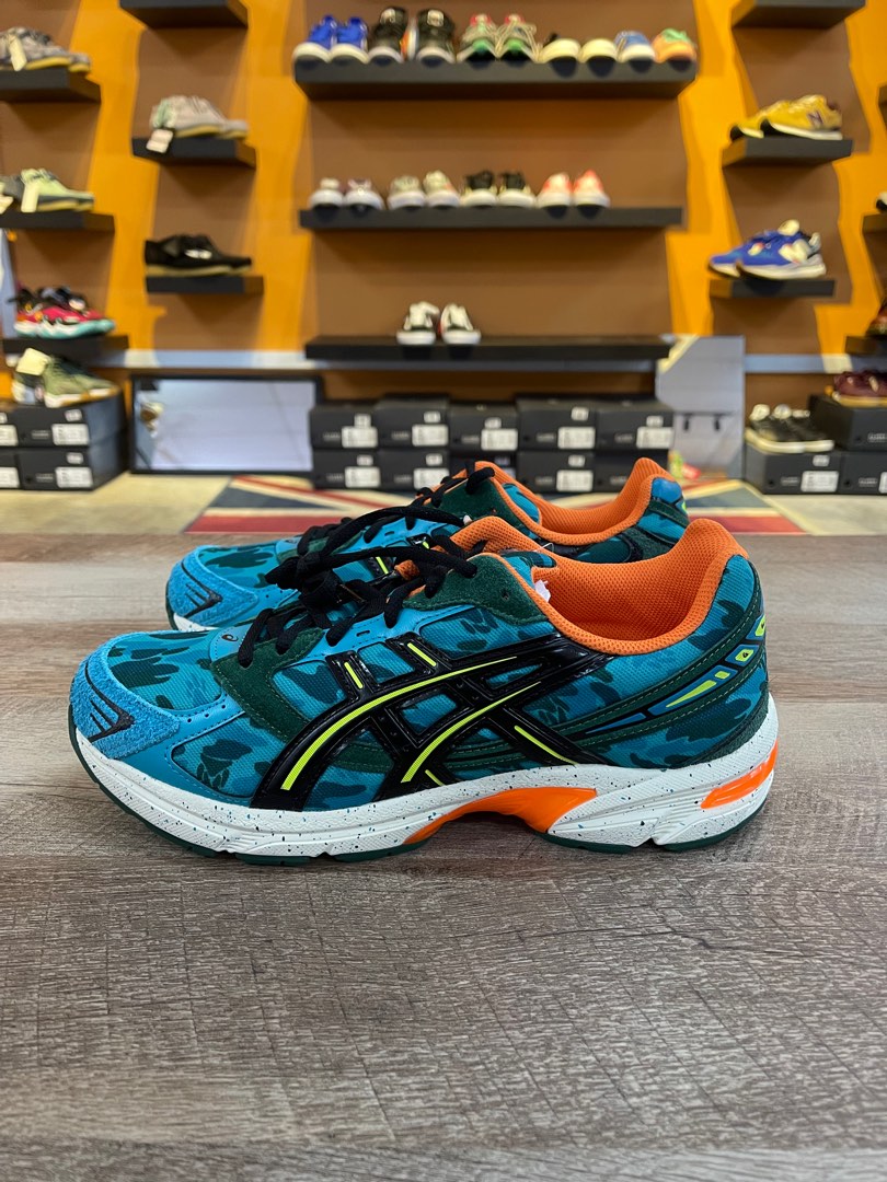 Asics me top