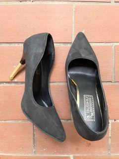 Black and gold heels
