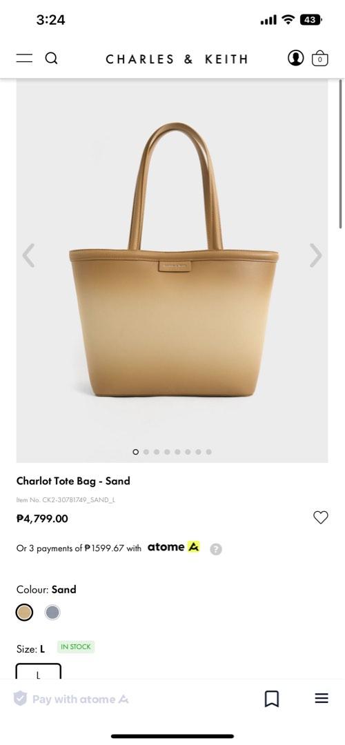 Charles & Keith (Category: Tote Bags) located in Valenzuela. Submitted by allaboutthings12 (Listing ID 1191155600, Image 3). Description: Double handles Magnetic closure Comes with pouch (detachable) Material: Faux leather Depth (cm): 14 Width (cm): 30 Height (cm): 27 With paperbag and dust bag.
