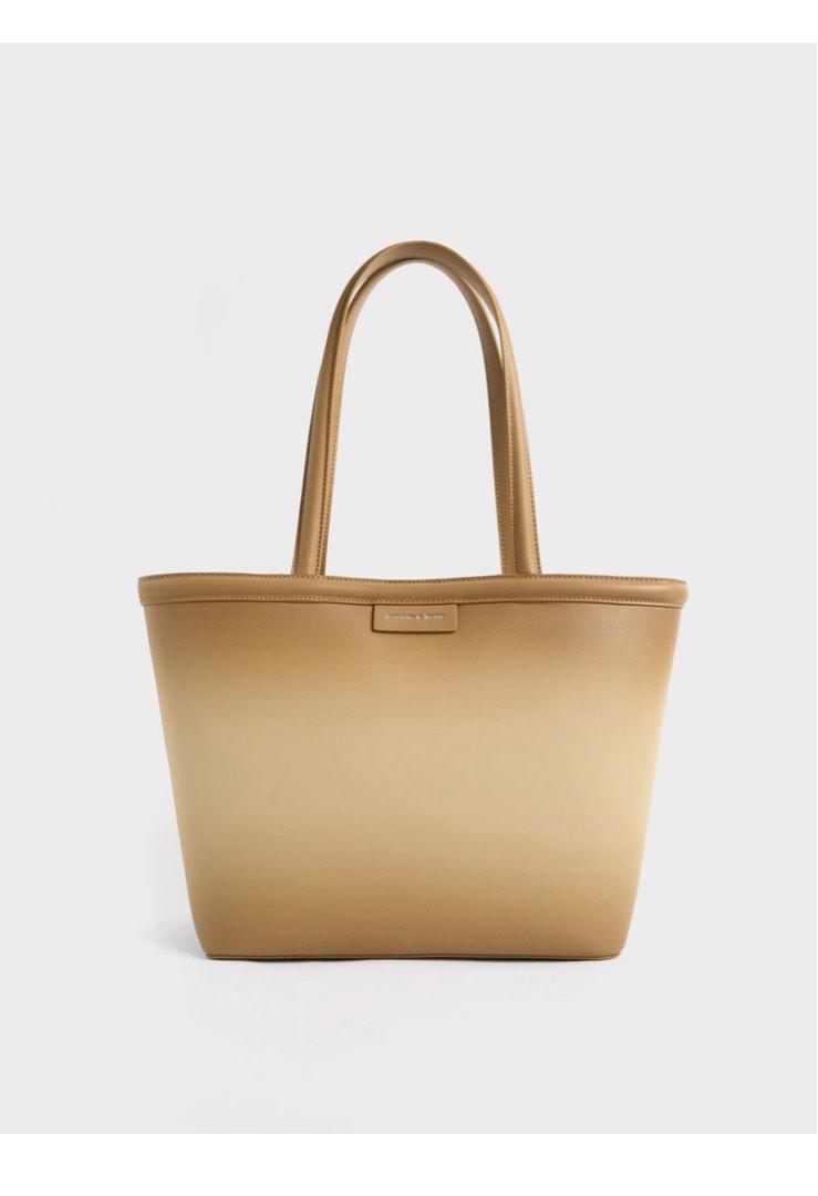 Charles & Keith (Category: Tote Bags) located in Valenzuela. Submitted by allaboutthings12 (Listing ID 1191155600, Image 2). Description: Double handles Magnetic closure Comes with pouch (detachable) Material: Faux leather Depth (cm): 14 Width (cm): 30 Height (cm): 27 With paperbag and dust bag.