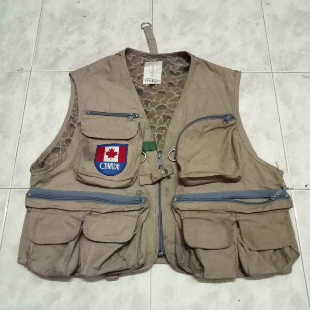 fishing vest by fox fire and free tiemco hook hone, Men's Fashion, Tops &  Sets, Vests on Carousell