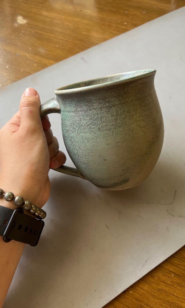 Handmade pot belly stoneware mug (Category: Coffee & Tea Tableware) located in Quezon City. Submitted by kuduu (Listing ID 1191203490, Image 1). Description: Handmade in CDO brand new Beautiful and classic design Gradient green color 1 pc only Location: Xavierville QC .
