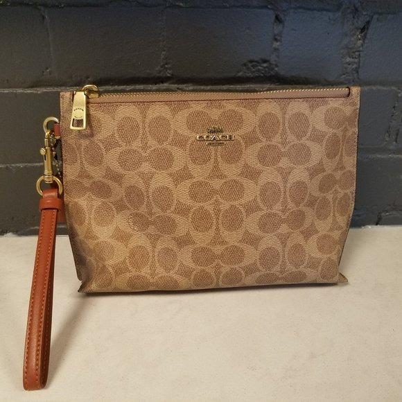 New Coach Original Brown Charlie Pouch Signature Canvas Wrist Wallet For  Women Come With Complete Set Suitable for Gift, Luxury, Bags & Wallets on  Carousell