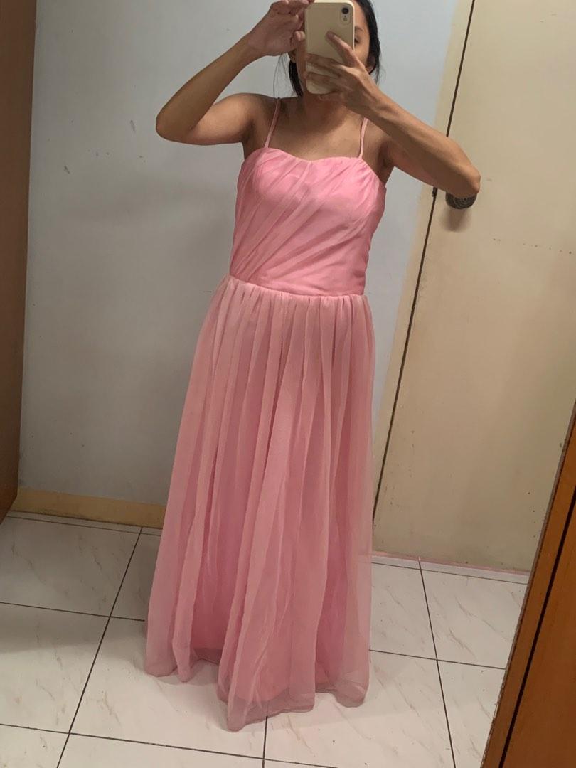 Pink Debut Bridesmaid Gown (Category: Evening dresses & gowns) located in Rizal. Submitted by thriftmanilaxx (Listing ID 1191110556, Image 3). Description: Pink Gown Material: Taffeta silk + froster organza - Custom made - Used once in a wedding - Outer looks new but there’s discoloration in the lining due to storage (see photos) - No stretch, zipped back so take note of measurements Size: Small Bust: 32in no stretch Waist: 27in perfect fit but c