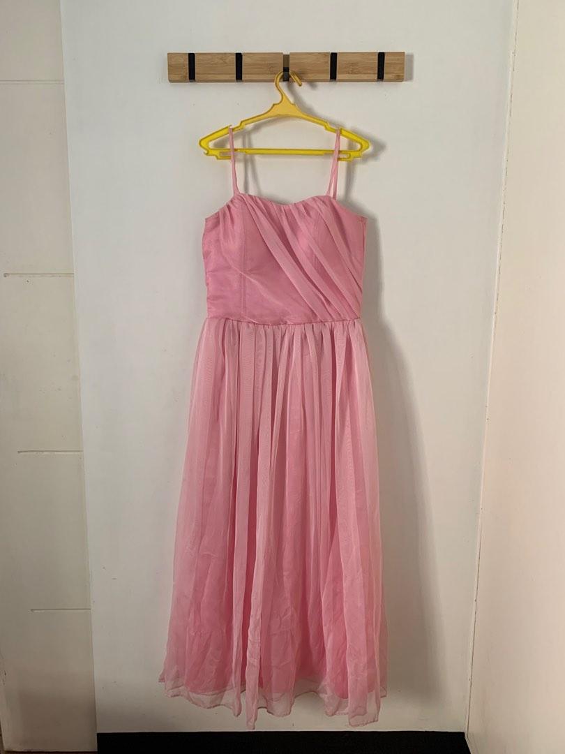 Pink Debut Bridesmaid Gown (Category: Evening dresses & gowns) located in Rizal. Submitted by thriftmanilaxx (Listing ID 1191110556, Image 1). Description: Pink Gown Material: Taffeta silk + froster organza - Custom made - Used once in a wedding - Outer looks new but there’s discoloration in the lining due to storage (see photos) - No stretch, zipped back so take note of measurements Size: Small Bust: 32in no stretch Waist: 27in perfect fit but c