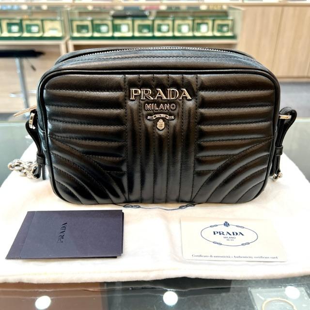 SOLD** PRADA Diagramme Black Leather Camera Bag, Luxury, Bags & Wallets on  Carousell