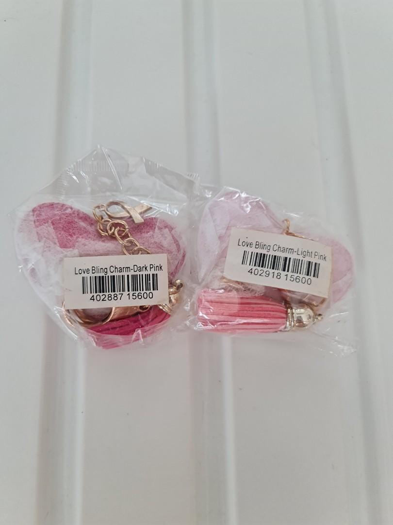 Tupperware Keychain (Category: Vintage Collectibles) located in Singapore. Submitted by puppier (Listing ID 1191104331, Image 2). Description: Brand new Tupperware love bling charm keychain in 2 colours. Both keychains for 5 dollars..