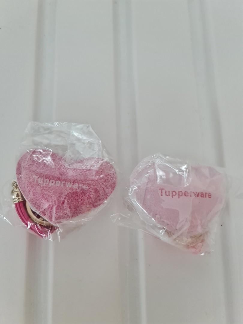 Tupperware Keychain (Category: Vintage Collectibles) located in Singapore. Submitted by puppier (Listing ID 1191104331, Image 1). Description: Brand new Tupperware love bling charm keychain in 2 colours. Both keychains for 5 dollars..