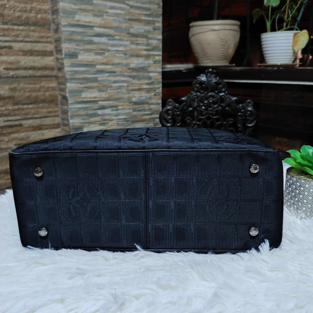 🇯🇵 Chanel Travel Line (Category: Luxury Bags & Wallets) located in Makati City. Submitted by yerbua103 (Listing ID 1191276050, Image 2). Description: ✔️ 🇯🇵Japan Auction 🇯🇵 Chanel travel line are characterized by their nylon construction with signature CC square quilting. it features 2 top handles and spacious main compartment. This bag is circa 2004-2005, black color and made of nylon/leather material, signature interlocking CC logo, with p