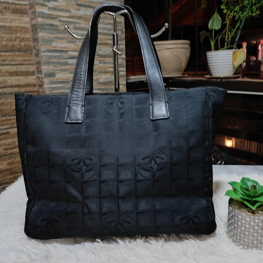 🇯🇵 Chanel Travel Line (Category: Luxury Bags & Wallets) located in Makati City. Submitted by yerbua103 (Listing ID 1191276050, Image 1). Description: ✔️ 🇯🇵Japan Auction 🇯🇵 Chanel travel line are characterized by their nylon construction with signature CC square quilting. it features 2 top handles and spacious main compartment. This bag is circa 2004-2005, black color and made of nylon/leather material, signature interlocking CC logo, with p