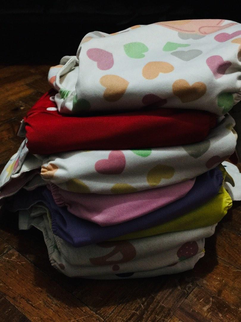 Clothes diaper with bambo insert take all (Category: Diapers & Baby Wipes) located in Makati City. Submitted by aj0616 (Listing ID 1191412865, Image 1). Description: 9pcs take all clothes diaper bambo black ung insert negotiable .