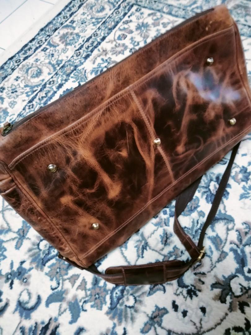 Kodiak leather duffel bag, Luxury, Bags & Wallets on Carousell