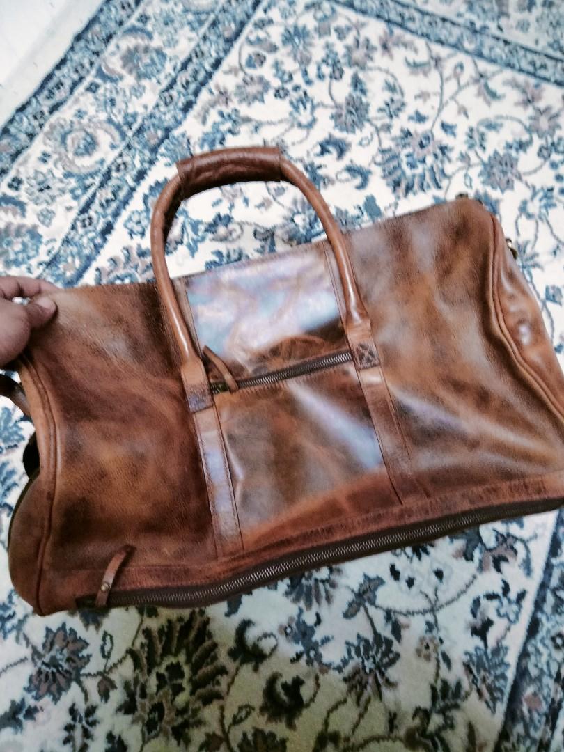 Kodiak leather duffel bag, Luxury, Bags & Wallets on Carousell