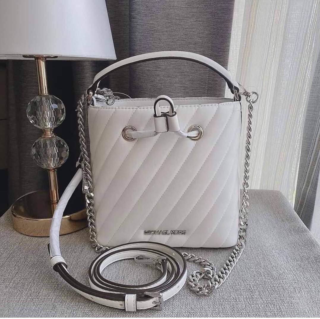 MICHAEL KORS Suri Small Quilted Crossbody (Category: Luxury Bags & Wallets) located in Cavite. Submitted by LuxbyMarifrance (Listing ID 1191450139, Image 3). Description: 🏷️ 3,200 only + SF 🛍️ MICHAEL KORS Suri Small Quilted Crossbody 📏 7”W X 7”H X 4.5”D 📌 with tag, care card, dust bag, paper bag ✨All trademarks, logos and brand names are reserved and property of the original brand owners. #LuxbyMarifrance #authentic💯 #lowestpriceguaranteed 