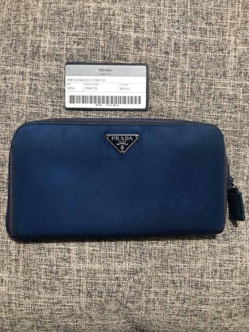 Prada wallet with authenticity card, Women's Fashion, Bags & Wallets