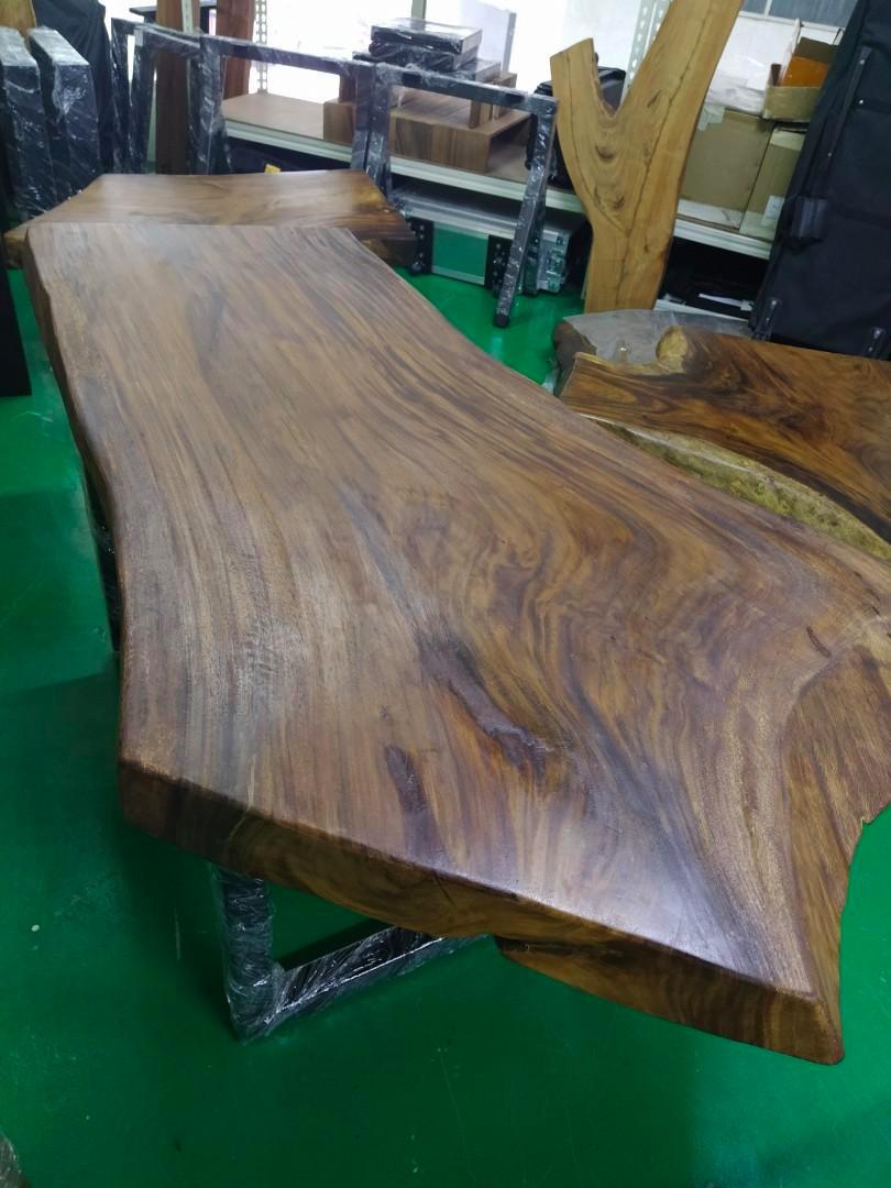 Raintree solid wood dining table (Category: Tables & Sets) located in Petaling Jaya. Submitted by kingchicken (Listing ID 1191295846, Image 3). Description: Product Features: --Solid construction --Each piece is unique --High quality workmanship with natural beautiful wood grains. --Great to use at home and office and more. --Made by real Rain wood material. Dimension - L 158cm x W 92cm,60cm x H74cm Thickness - 8cm Self pickup only..