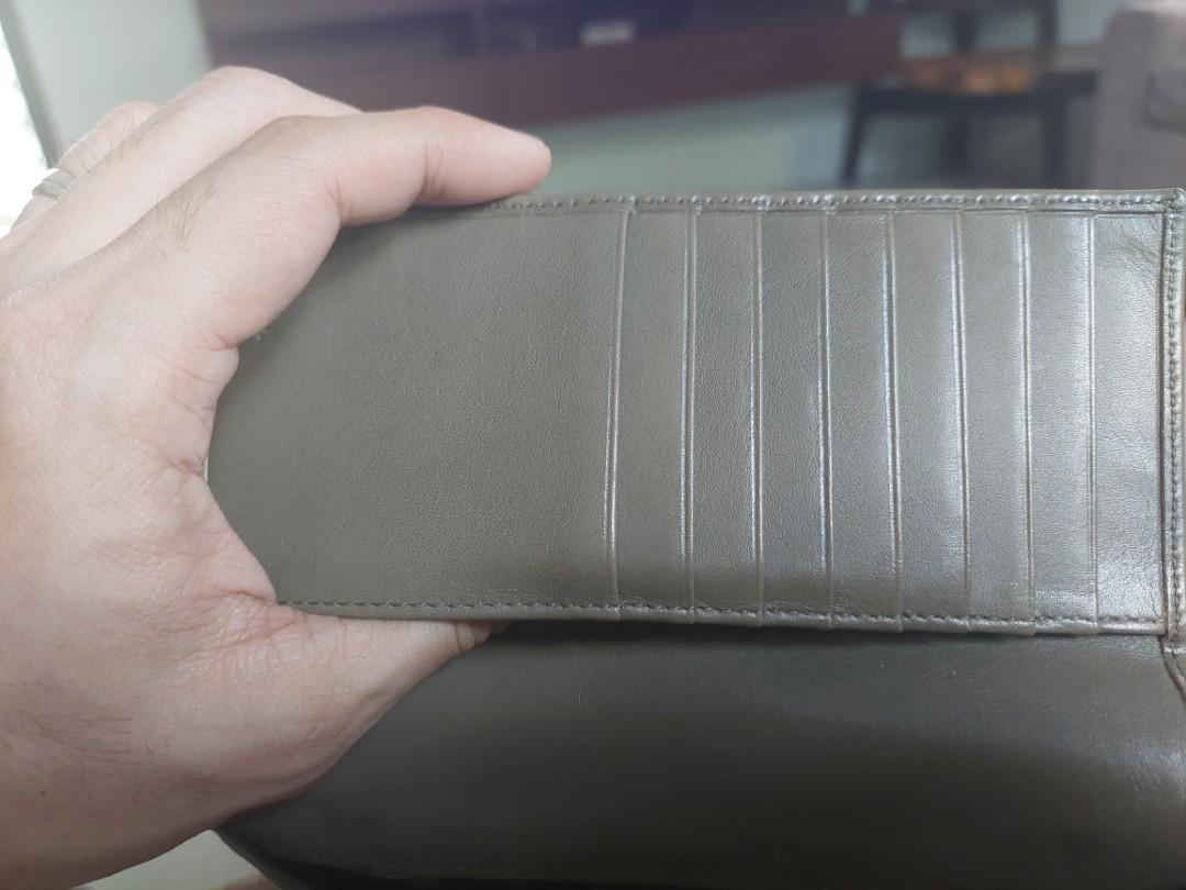 FURLA WALLET authentic (Category: Luxury Bags & Wallets) located in Quezon City. Submitted by luckgal (Listing ID 1191498903, Image 3). Description: hardware all intact just one minor flaw from the button as seen on the picture. sign of usage since daily used..