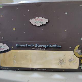 Huppy Buppy Breastmilk storage bottles with covers