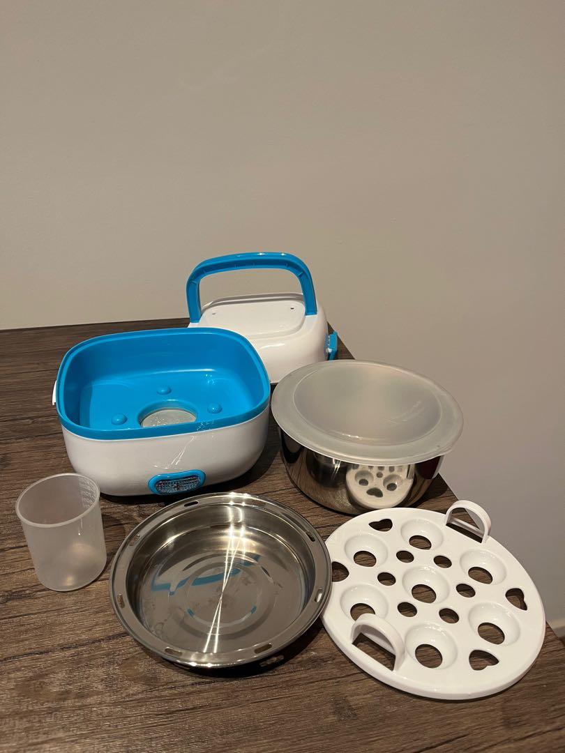 Multi function mini steam cooker (Category: Cookware & Accessories) located in Kuala Lumpur. Submitted by dear886 (Listing ID 1191593021, Image 2). Description: One button mini food steamer/rice cooker. Easy 3 Steps To Use: -Fill in adequate water from the measurement cup to the lunch box. -Put in the food container. -Press the start button and your meal will be prepared hot in minutes. Specifications: Material: Hard plastic, Stainless steel Powe